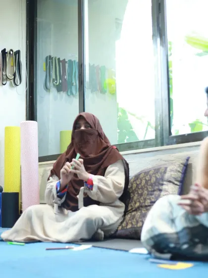 Capturing the diversity of the group, this photo shows a woman in a hijab participating in the meet-up.