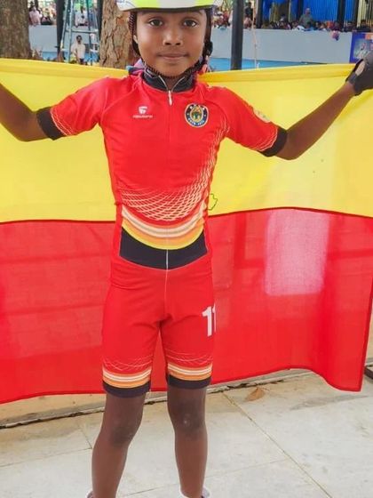 Our strong girl Veeksha, a national bronze medalist, proudly holding the Karnataka flag.