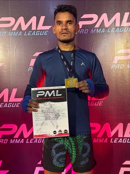Ramit proudly displaying his gold medal from the Pro MMA League. A great comeback that shows his dedication to the sport.