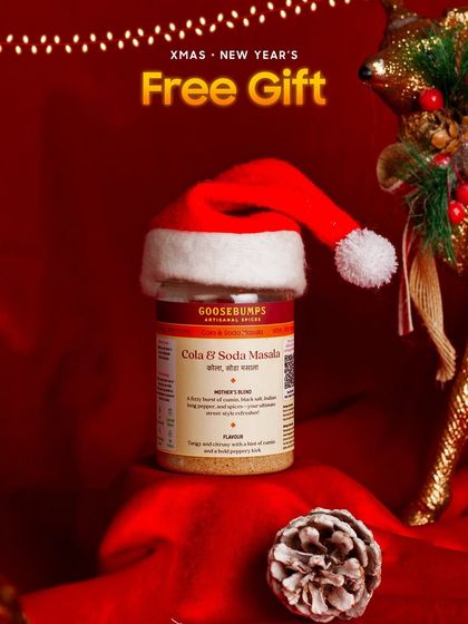 Every party hamper comes with a little something extra. This image shows the free gift, a jar of my special Cola and Soda Masala, perfect for creating fizzy, flavourful drinks.