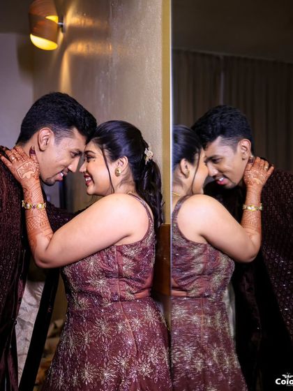 A creative shot using a mirror to capture the couple's reflection and their intimate gaze.