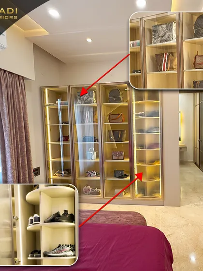 A custom-designed, walk-in wardrobe that combines style with practicality. This image highlights the glass-paneled display cabinets with internal lighting, perfect for showcasing a collection of luxury bags and shoes, demonstrating my attention to personalized storage solutions.