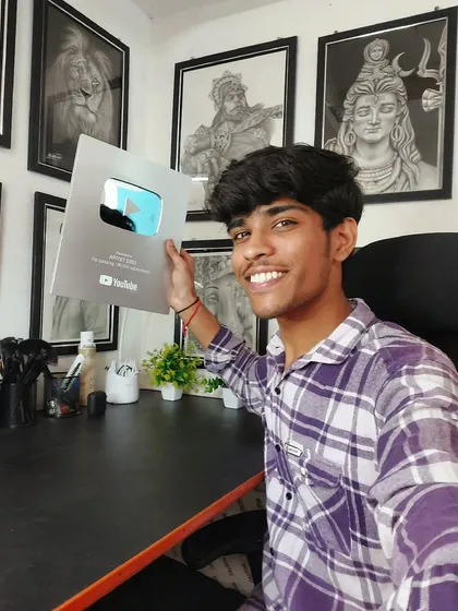 Celebrating the arrival of my YouTube Silver Play Button. Thank you to everyone who has supported my channel and my art.