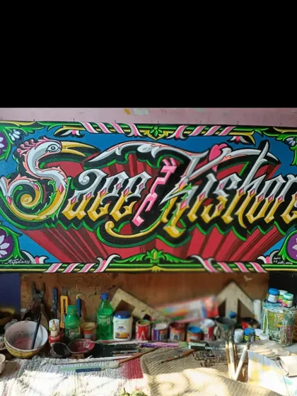 A custom name sign for "Saeef Kishore" done in a flowing, almost graffiti-like style but with the precision of truck art.