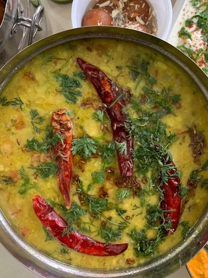 A close-up of my flavorful Dal Tadka, tempered with whole red chillies.