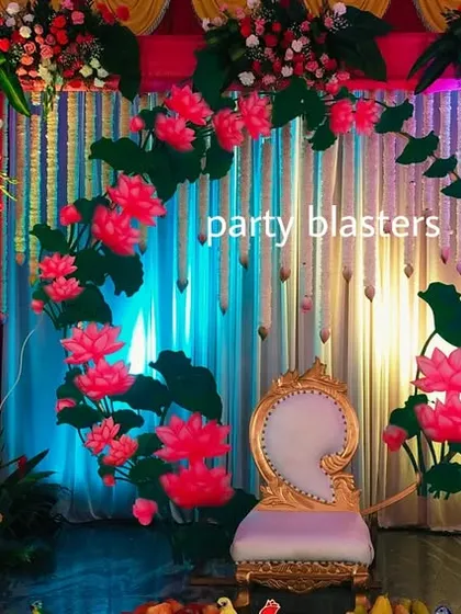 This unique lotus-themed stage was designed for a special ceremony. I used custom-cut lotus props, dramatic lighting, and flowing floral arrangements to create a visually stunning and memorable centerpiece for the event.