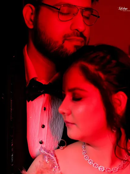 A dramatic portrait using bold red lighting to create a moody and passionate atmosphere. I love experimenting with light to create unique and artistic shots.