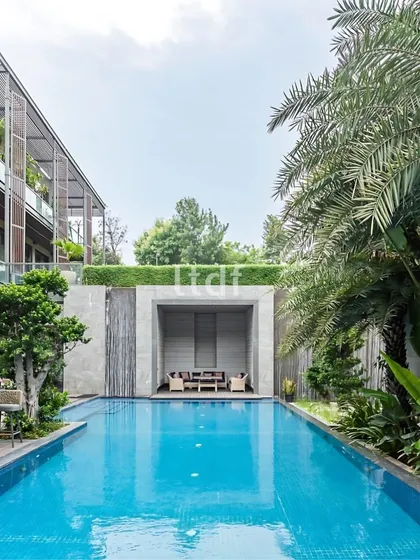 Villa Nova is a luxury residence designed to merge indoor and outdoor spaces. The sleek exterior, featuring floor-to-ceiling glass, floods the interiors with natural light and offers uninterrupted views of the pool and surrounding landscape.