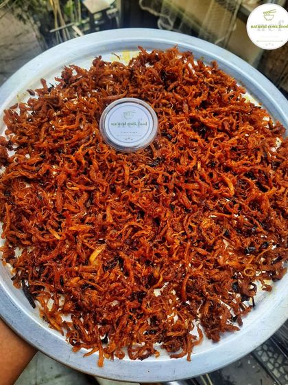 My chicken dry singju, a different take on the classic salad. The chicken is shredded and seasoned to create a delicious, savory snack.