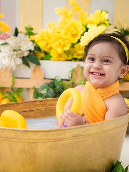 A sweet and gentle smile. Milk bath sessions can also be calm and serene, capturing a different side of your baby's personality.