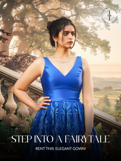 Step into your own fairytale with this royal blue satin gown. The voluminous skirt and classic V-neck create a timeless princess silhouette, perfect for making a grand entrance.