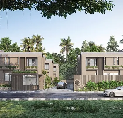 The entrance to our Vagator Villas development, where soft-edged, earthy forms create a welcoming and understated presence. The design uses minimal lines and a muted color palette to blend the architecture with the lush Goan outdoors.