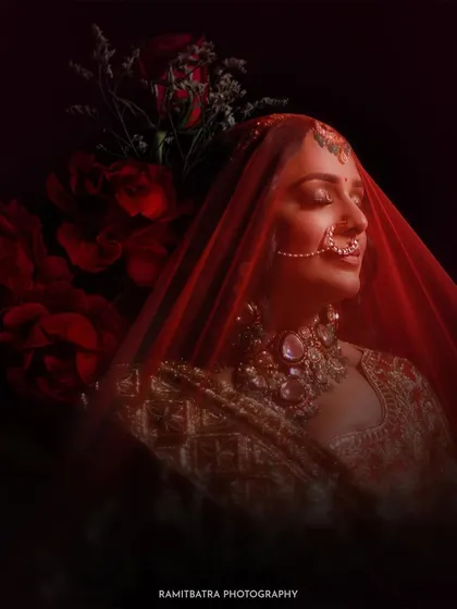 A dramatic and soulful bridal portrait. I use light and shadow to create artistic, magazine-worthy images that capture the bride's elegance and the quiet emotion she feels on her wedding day.