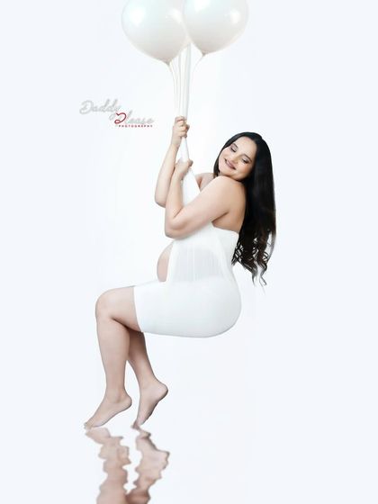 A variation of the floating balloon concept, capturing a sweet and happy expression. The reflection adds depth and a touch of magic to the composition.