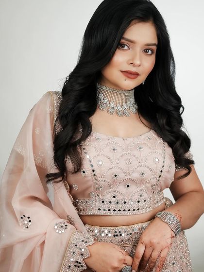 The full look, showing how the makeup and outfit create a harmonious and stylish appearance.