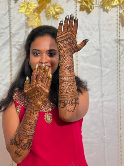 The beautiful bride Nagashree, looking radiant and happy with her personalized wedding mehendi.