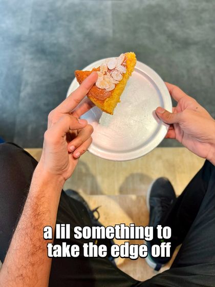 A slice of our almond cake, a simple and satisfying treat for any time of day.