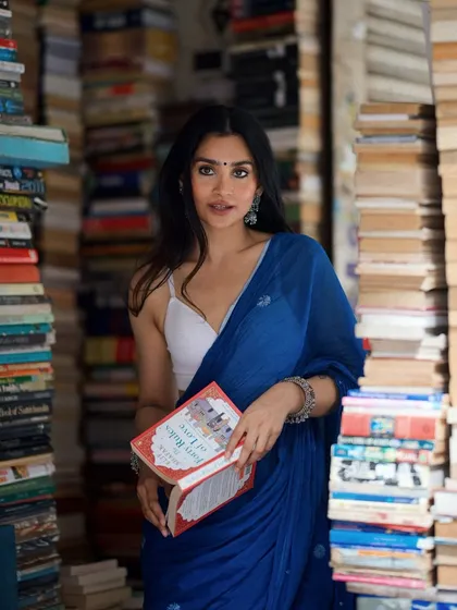 A direct-to-camera look from my Kolkata bookstore shoot, creating a personal connection with the viewer.