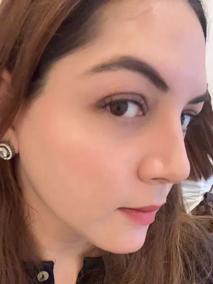 A side profile showcasing the delicate curl and length of a natural lash set. It provides just enough lift to open up the eye.
