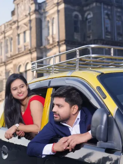 Capturing the quintessential Mumbai experience with a pre-wedding shot in a 'kaali-peeli' taxi. We incorporate local elements to make your photos uniquely 'Mumbaikarwala'.