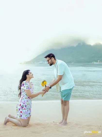 A playful and sweet proposal moment captured on the beach. We help couples enact and capture these special memories during their pre-wedding session.