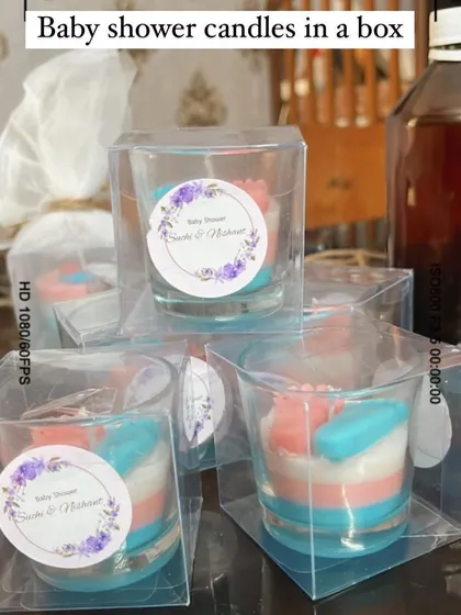 Another look at our baby shower candles in box packaging, perfect for keeping the candle safe and making it easy to gift.