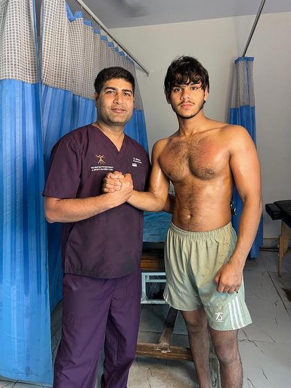 A handshake with a happy client, Shivam, post-session.