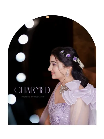A 'Charmed' portrait of the bride, her profile beautifully lit against a backdrop of vanity lights.