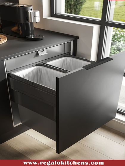 A clean kitchen starts with smart waste management. We integrate pull-out dustbin systems directly into your cabinetry, keeping trash and recycling bins hidden from view but easily accessible.