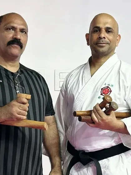 A close-up with Sensei Jabir, highlighting the traditional Kobudo weapons we trained with during his visit.
