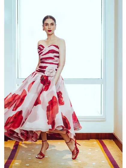 Another look at the Gauri and Nainika gown, this time with a floral appliqué on the bodice, adding another layer of detail.