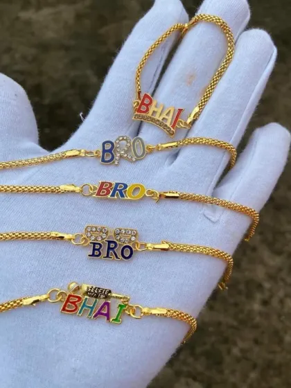 A full view of our fun and colorful "BHAI" and "BRO" rakhi bracelets, perfect for showing your brother some love with a bit of bling.