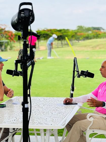Recording a podcast on nutrition against the backdrop of the driving range. We believe in immersing our partners in the athletic environment to foster a deeper understanding of our players' needs.
