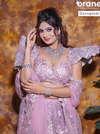 A glamorous party look with a dramatic lavender outfit. The makeup features a bold eye that picks up the color of the dress, a technique I teach in my color theory classes.