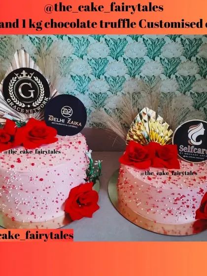 Another view of the matching corporate cakes with custom logo toppers.