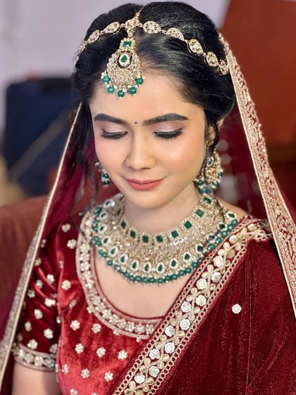 A detailed shot of the eye makeup. The soft, shimmery tones on the lids make her eyes pop without being overpowering.