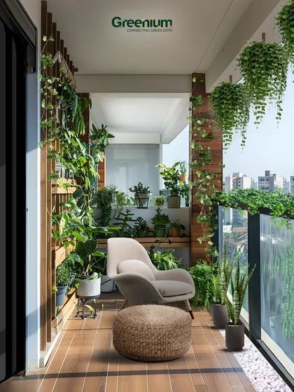 This luxurious green retreat on a balcony features a mix of hanging plants, a vertical garden, and floor planters. It's a perfect example of how to create a private, serene escape in the city.
