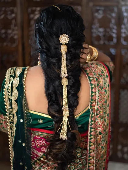 This view shows the full length and texture of the sider braid, a technique we practice in the advanced hairstyling class.