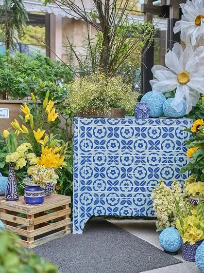 Another view of the playful decor corner, showing the blue and white patterned console table.