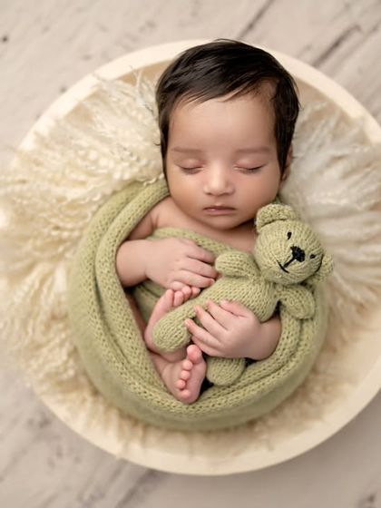 Another angle of our little teddy bear in the bowl, showing off his amazing hair and peaceful sleep.
