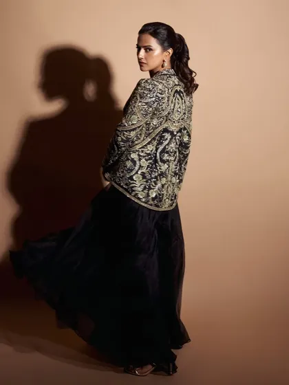 For the 'Celebrating Venky 75' event, I styled Shraddha Srinath in this elegant black ensemble. The heavily embroidered jacket over a flowing skirt creates a look that is both regal and modern.