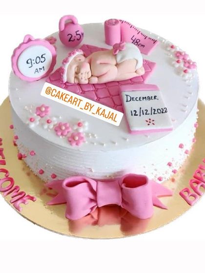 A detailed welcome baby cake showing the baby's birth date and time.