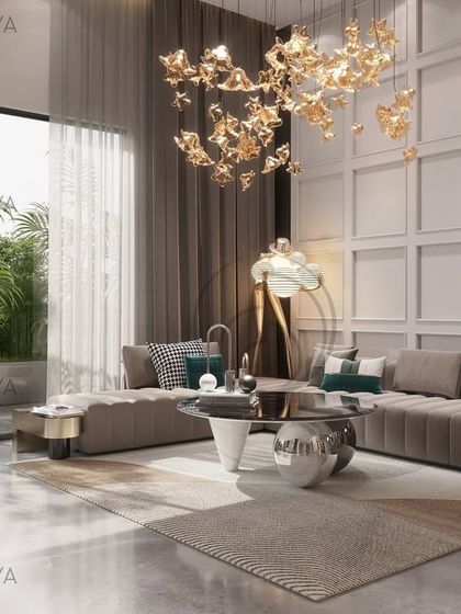 This lounge area was designed in response to the room's natural light and volume. We used layered lighting, including a statement chandelier, and a paneled wall to add texture and rhythm, creating a space that is both expansive and grounded.