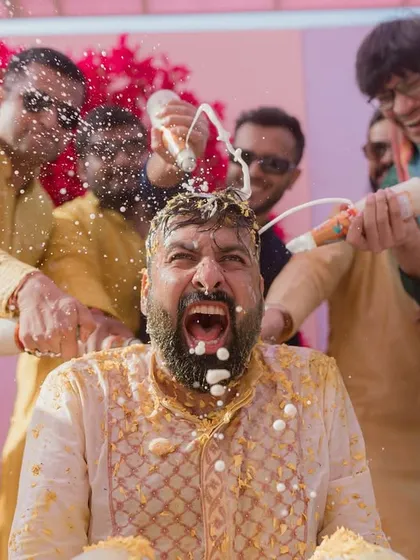 The groom's reaction says it all. These are the fun, candid moments that make a wedding memorable.