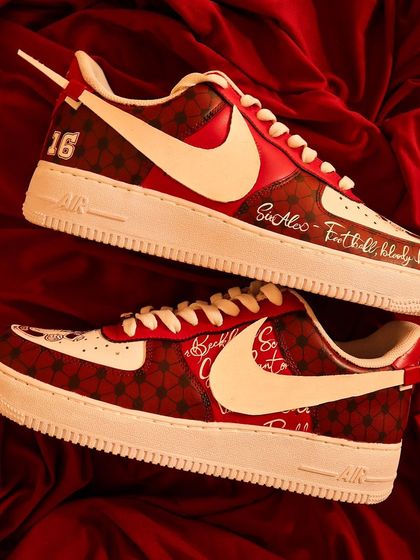 The completed Manchester United-themed Nike Air Force 1s. The bold red and white design, combined with all the personal details, makes this a truly one-of-a-kind pair for a true fan.