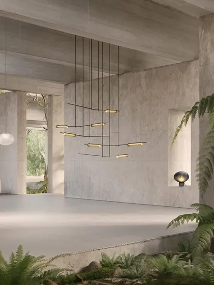 For me, lighting is kinetic art. The Volant chandelier is a perfect example, a static sculpture that appears to be in perpetual motion. Its angled glass elements and solid brass bars create an elegant equilibrium, making it a captivating focal point in modern, architectural interiors.