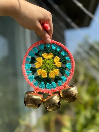 This ghungroo hanging features a beautiful mix of green, yellow, and teal. The colors are inspired by nature and festivals.