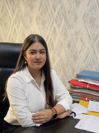 At my desk, surrounded by case files. This is where my experience works for you.