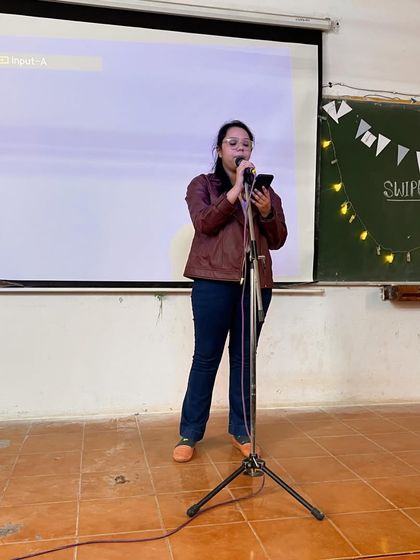 A student sharing her poem at the Gargi College slam. We are proud to support and encourage student-led literary initiatives.