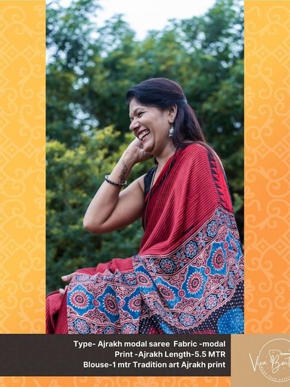 A candid moment with a customer enjoying her red Ajrakh modal saree. The happiness on her face is why I love what I do.